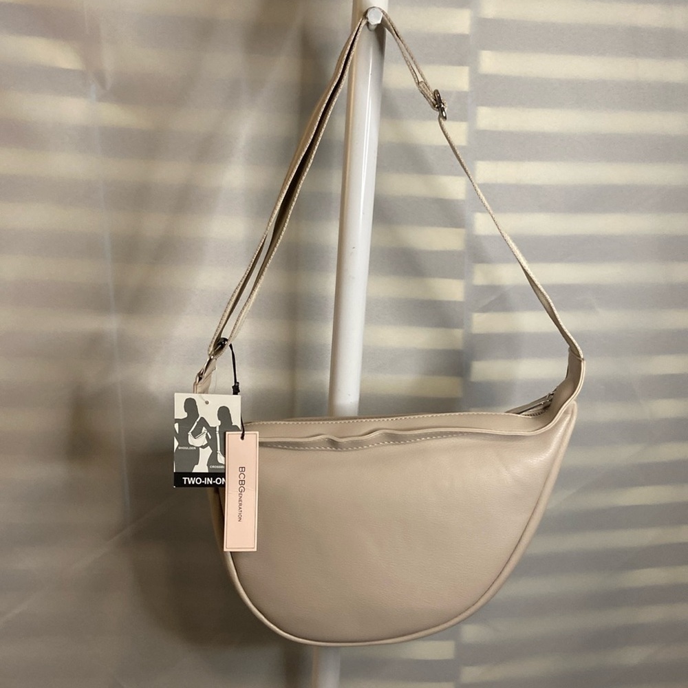 BCBGeneration NWT asymmetrical crossbody/shoulder/sling bag tan